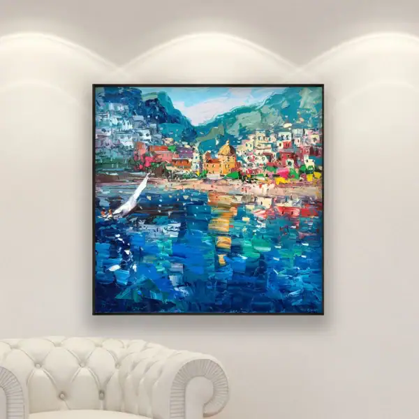 Detailed view of Agostino Veroni's original Positano oil painting with a sailboat and beach, displayed in a bright modern living room.