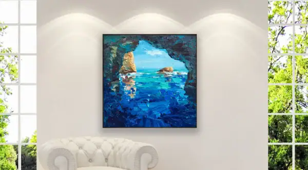 Close-up of the Blue Grotto painting by Agostino Veroni in a contemporary home setting, highlighting how the azure tones brighten a neutral wall.