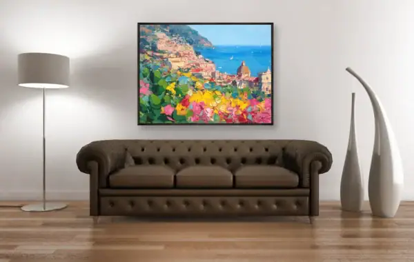 Large original Positano oil painting by Agostino Veroni hanging on a white wall above a classic brown leather sofa.