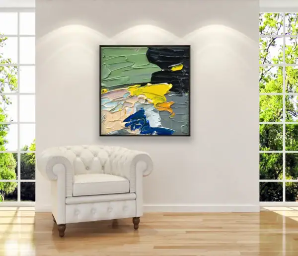 Modern abstract painting by Agostino Veroni hanging above a white leather armchair.