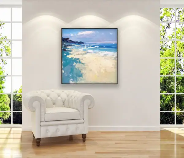 Sunny beach oil painting by Agostino Veroni styled in a minimalist interior with natural light and a white armchair.