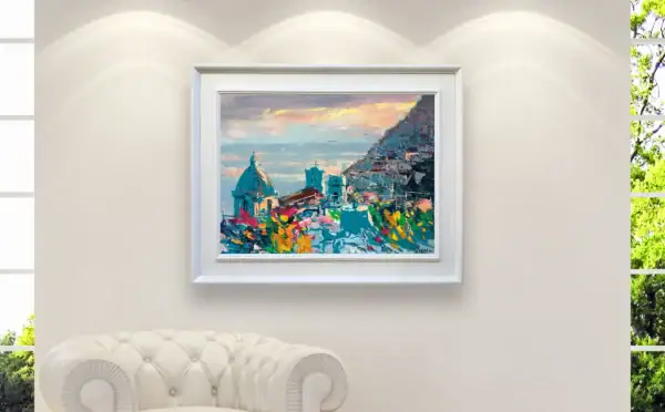 Agostino Veroni's original Positano sunset painting displayed in a refined home gallery setting, highlighting the atmospheric Mediterranean light.