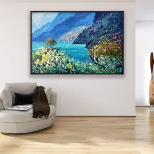 Positano terrace sea view oil painting on canvas displayed in a bright living room, overlooking the Mediterranean sea with coastal flowers in the foreground and Positano village in the distance.