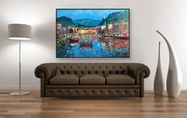 Large original Portofino oil painting displayed above a classic brown leather sofa in a luxury living room.