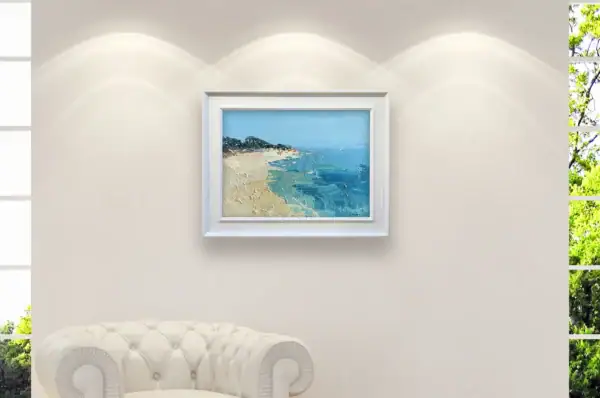 Vibrant Italian beach oil painting by Agostino Veroni placed above a luxury white sofa, showcasing elegant Mediterranean seaside home decor.