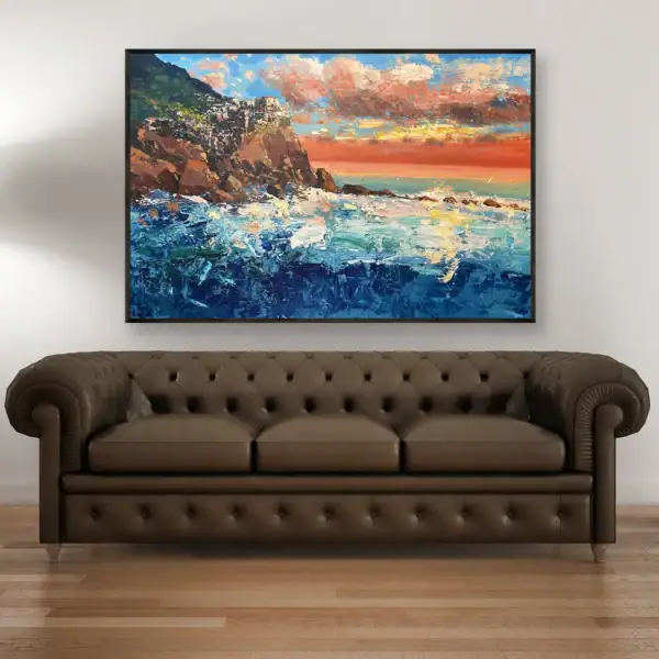 Large seascape oil painting of the Italian Riviera by Agostino Veroni displayed above a classic brown sofa, perfect for high-end interior design inspiration.