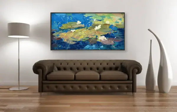 Large water lilies oil painting on canvas by Agostino Veroni displayed above a classic brown sofa, perfect for luxury interior design inspiration.