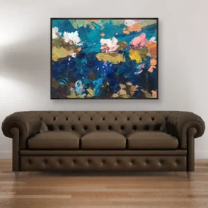 Water lilies pond oil painting on canvas displayed above a sofa, depicting floating water lilies on calm water with soft reflections and a modern impressionist style