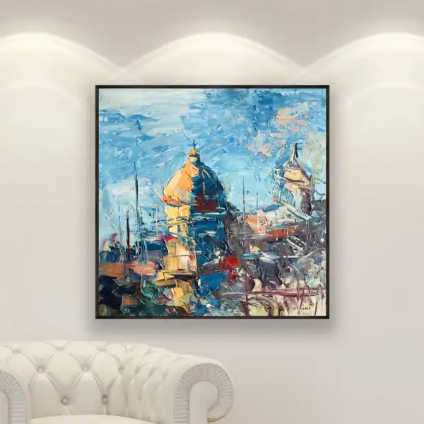 A bold and colorful original Positano oil painting with heavy impasto, shown in a modern home gallery setting highlighting its vibrant blue and gold tones.