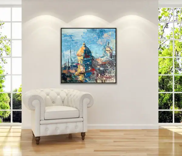 Textured modern impressionist painting of the Positano church dome by Agostino Veroni, hanging in a bright contemporary room next to a white leather armchair.