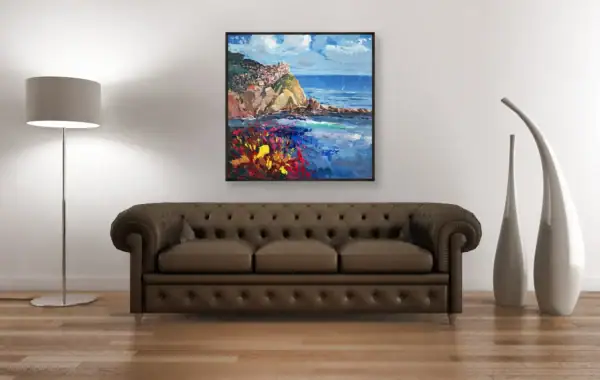 Manarola oil painting hanging above an elegant brown leather sofa, creating a sophisticated focal point in a luxury interior.