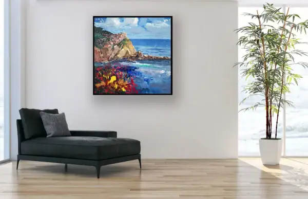 The vibrant Cinque Terre landscape by Agostino Veroni shown in a bright, contemporary living space, highlighting its Mediterranean colors.