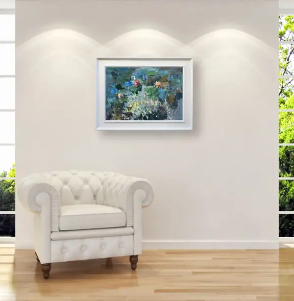 The original water lilies oil painting displayed in a bright, elegant interior next to a classic white leather armchair.