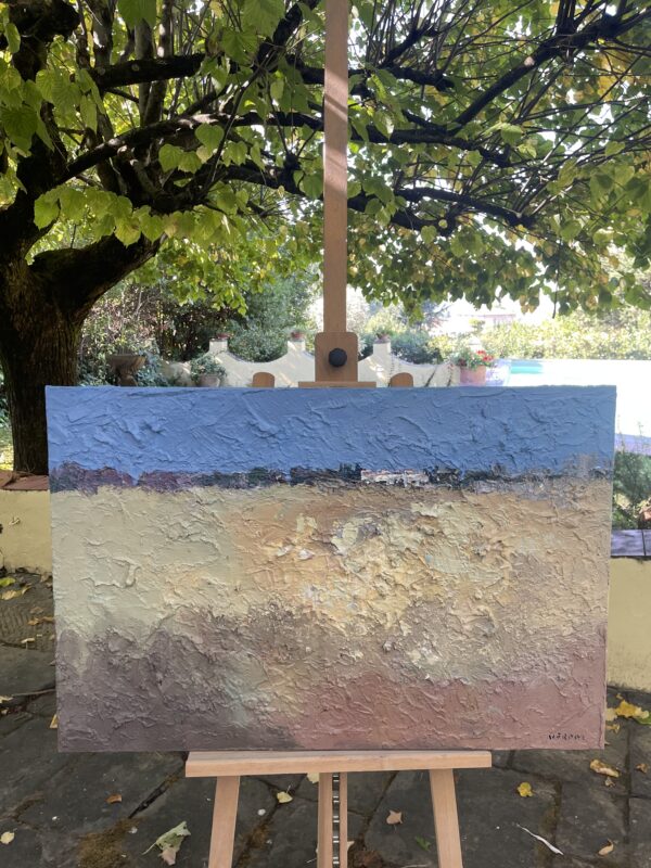 Abstract landscape oil painting on canvas by Agostino Veroni on wooden easel outdoors. Modern earth artwork in natural sunlight with green garden trees in the background.