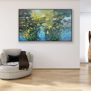 Water lilies oil painting on canvas displayed in a contemporary living room, horizontal pond water artwork with textured brushstrokes and expressive blue and green tones.