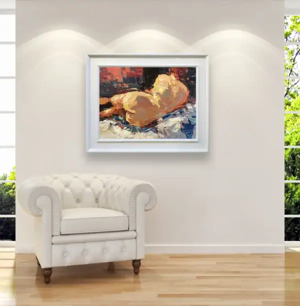 A sophisticated interior featuring the framed artistic nude oil painting by Agostino Veroni hanging on a neutral wall next to a classic white armchair.
