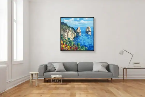 The square Capri oil painting hanging in a minimalist living room above a grey contemporary sofa, adding a splash of Mediterranean blue to the space.