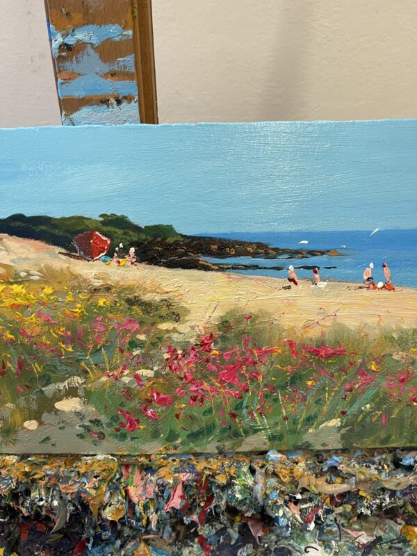 Detailed view of vibrant pink wildflowers and golden sand in a Sardinia beach painting, showing Agostino Veroni's palette knife technique.