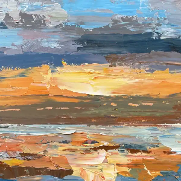 A detailed macro view focusing on the intense burst of yellow, gold, and orange light at the central horizon line.