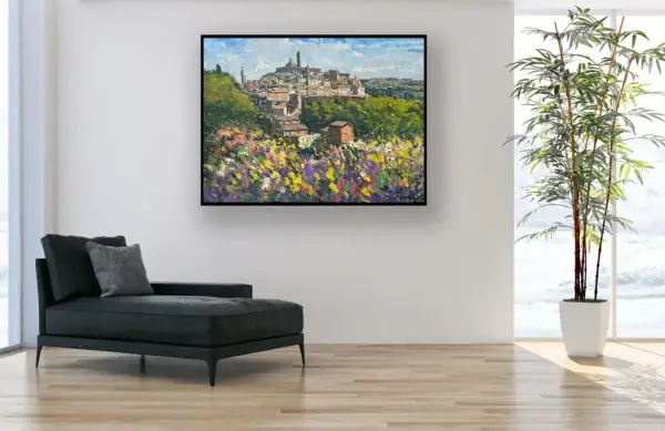 An Italian landscape oil painting on canvas displayed in a spacious, sunlit living room next to a sleek black chaise longue.