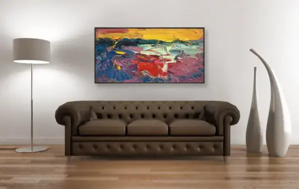 The large horizontal abstract oil painting displayed in a luxury interior above a classic brown leather Chesterfield sofa.
