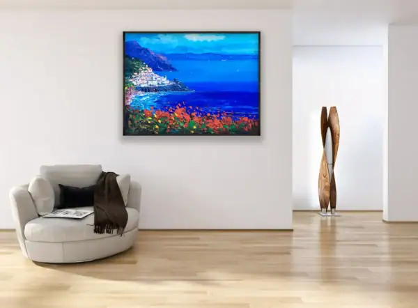 Large framed coastal landscape painting displayed beautifully to add an exclusive Mediterranean atmosphere in a bright luxury dining space or modern seating area.