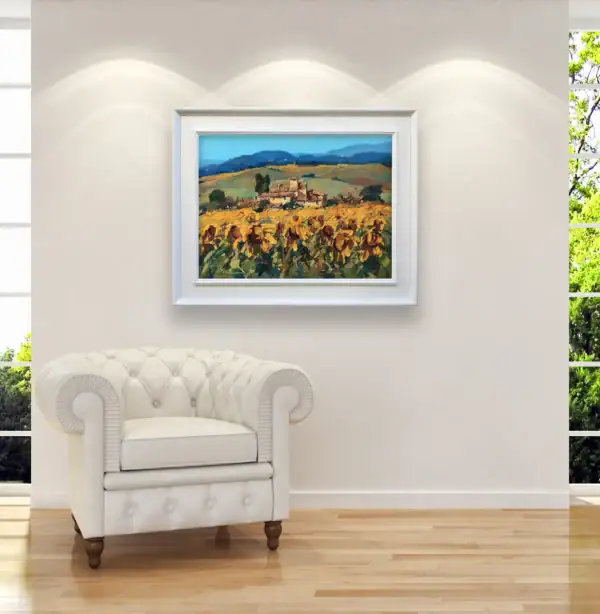 Large framed sunflower field painting displayed as a warm, luminous focal point in a bright contemporary dining space or luxury lounge room.