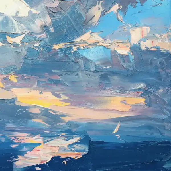 Detailed macro shot showing the luminous yellow and orange sky reflections cutting through the deep blue sea layers.