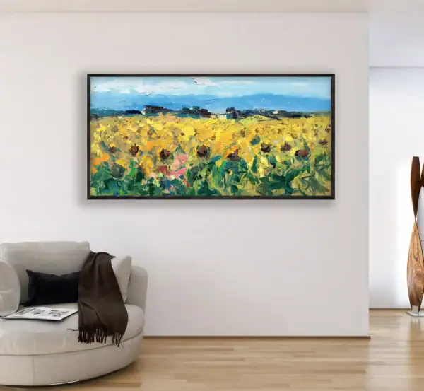 The original sunflower oil painting displayed in a bright modern living room, adding a warm and sunny atmosphere to the interior.