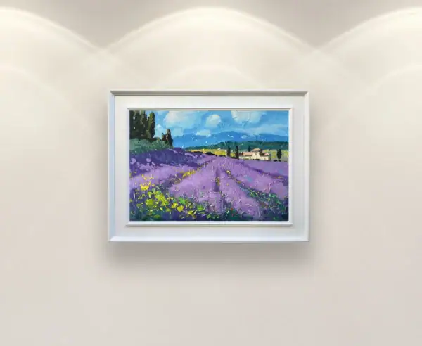The elegant framed lavender field painting hanging symmetrically under soft gallery spotlights on a clean contemporary wall.