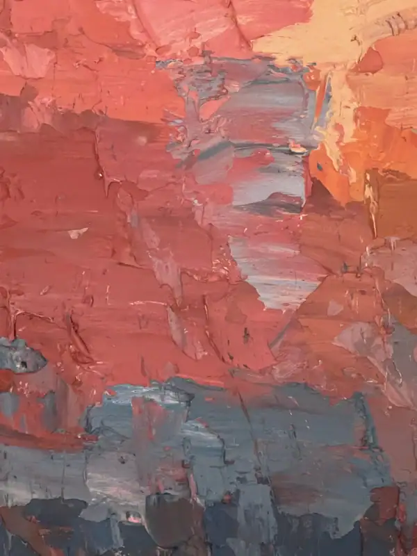 A detailed view focusing on the emotional interplay of textures where the warm pinkish terracotta blends into deep dark grey tones.