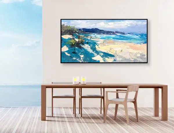 The original seascape oil painting hanging in a bright, modern dining room with a wooden table and a stunning sea view through the window.