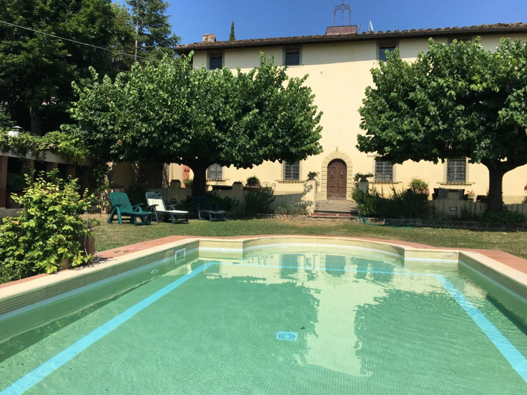 Villa Minghetti Tuscan villa vacation rental with private panoramic swimming pool and historic facade in Spicchio di Lamporecchio, near Vinci, Italy.
