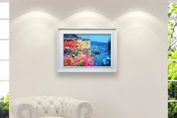 Original Portofino oil painting with white frame hanging on a wall above a sofa in a modern room setup.