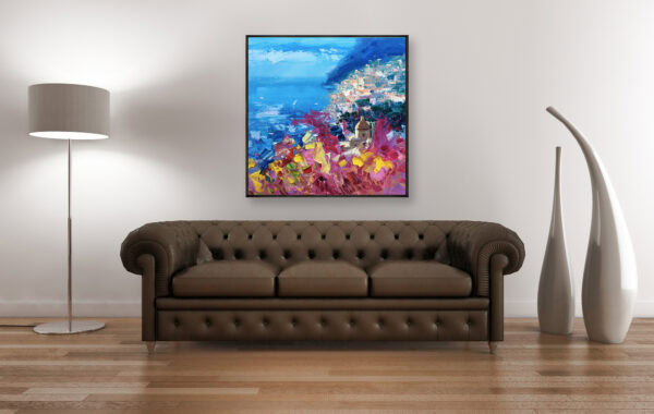 Large original Positano painting hanging above a classic leather couch as home wall decor accent.