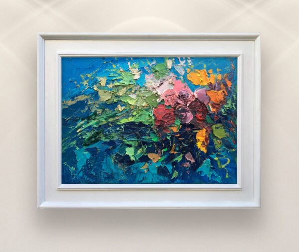 Framed roses oil painting on canvas by Veroni. Original impressionist floral art in white frame on gallery wall, showing heavy palette knife impasto in red, pink, green, and blue.(