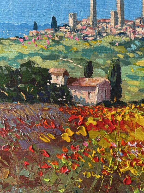 Close-up of a textured oil painting on canvas showing the San Gimignano skyline and a vivid red poppy field with visible palette knife strokes.